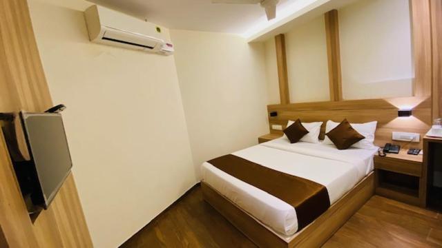 Hotel Plaza Heights Μπανγκαλόρ Δωμάτιο φωτογραφία